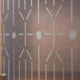 Danish vintage corner cabinet in teak and glass