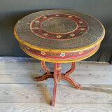 Pedestal table in polychrome wood and gold metal veneer