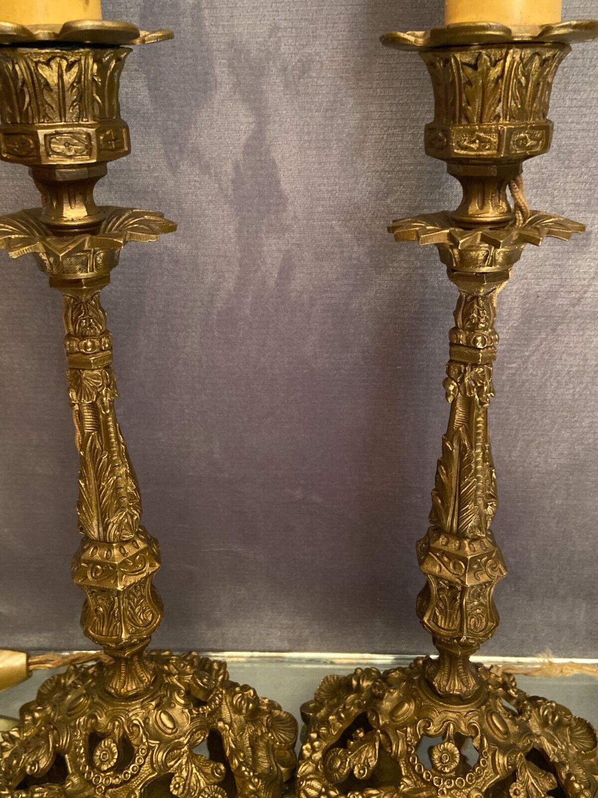 Pair of candlesticks mounted in late nineteenth century bronze lamp base Renaissance style