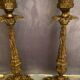 Pair of candlesticks mounted in late nineteenth century bronze lamp base Renaissance style