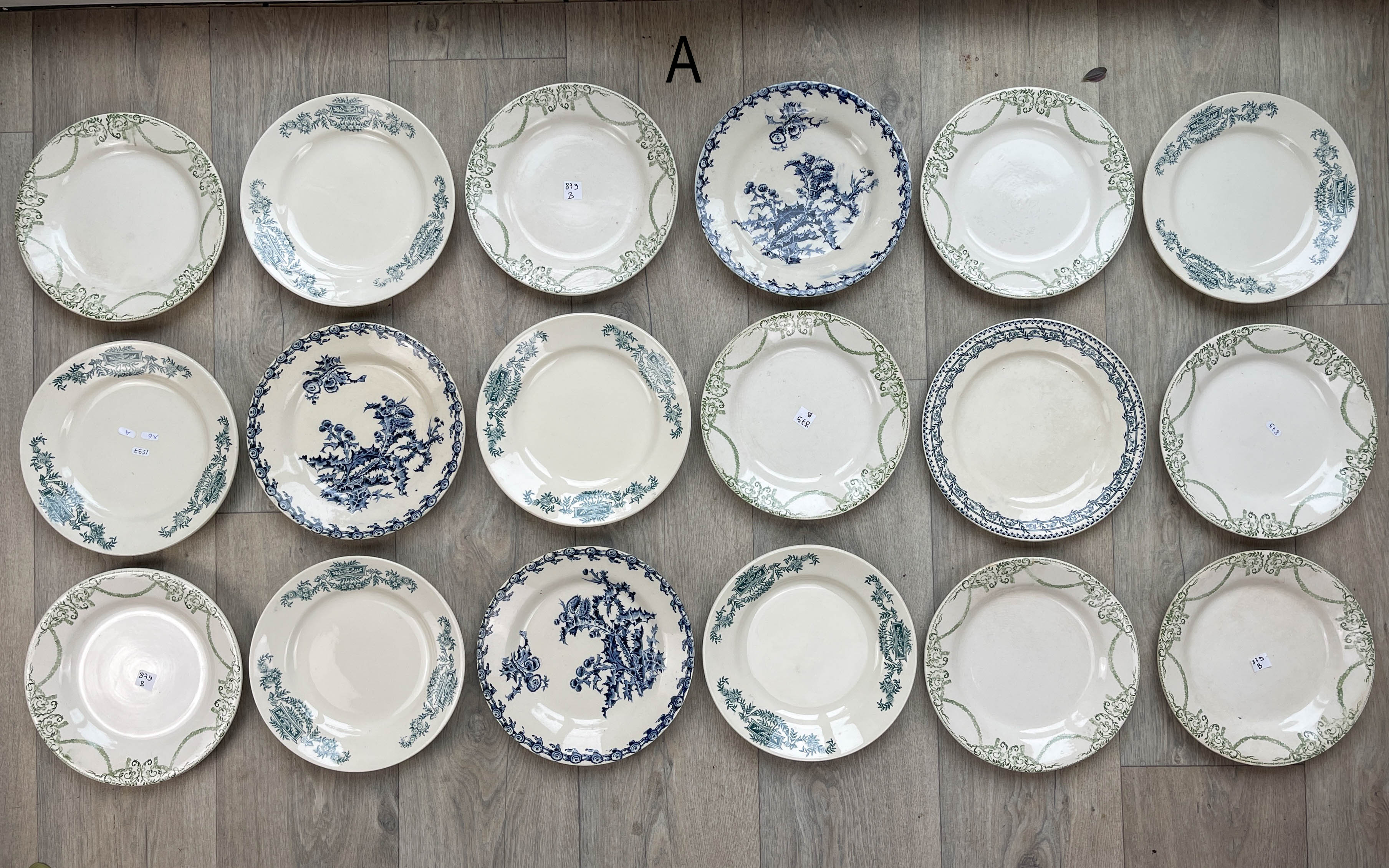 6 green and blue mismatched iron earth plates