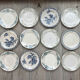 6 green and blue mismatched iron earth plates