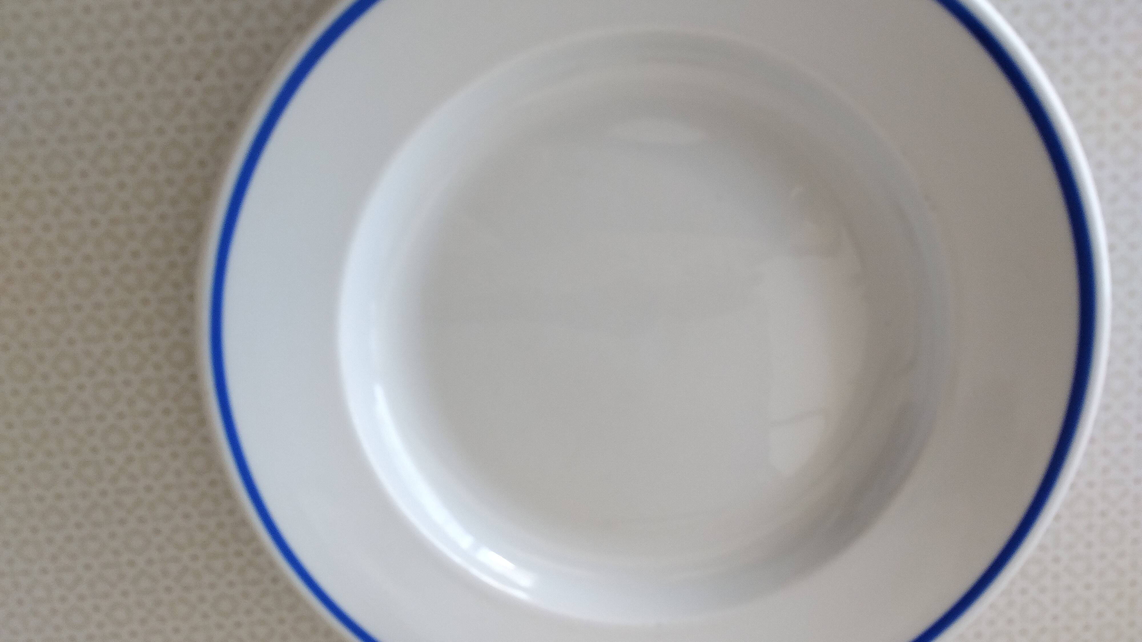 3 Pillivuyt white porcelain dinner plates with blue edging.