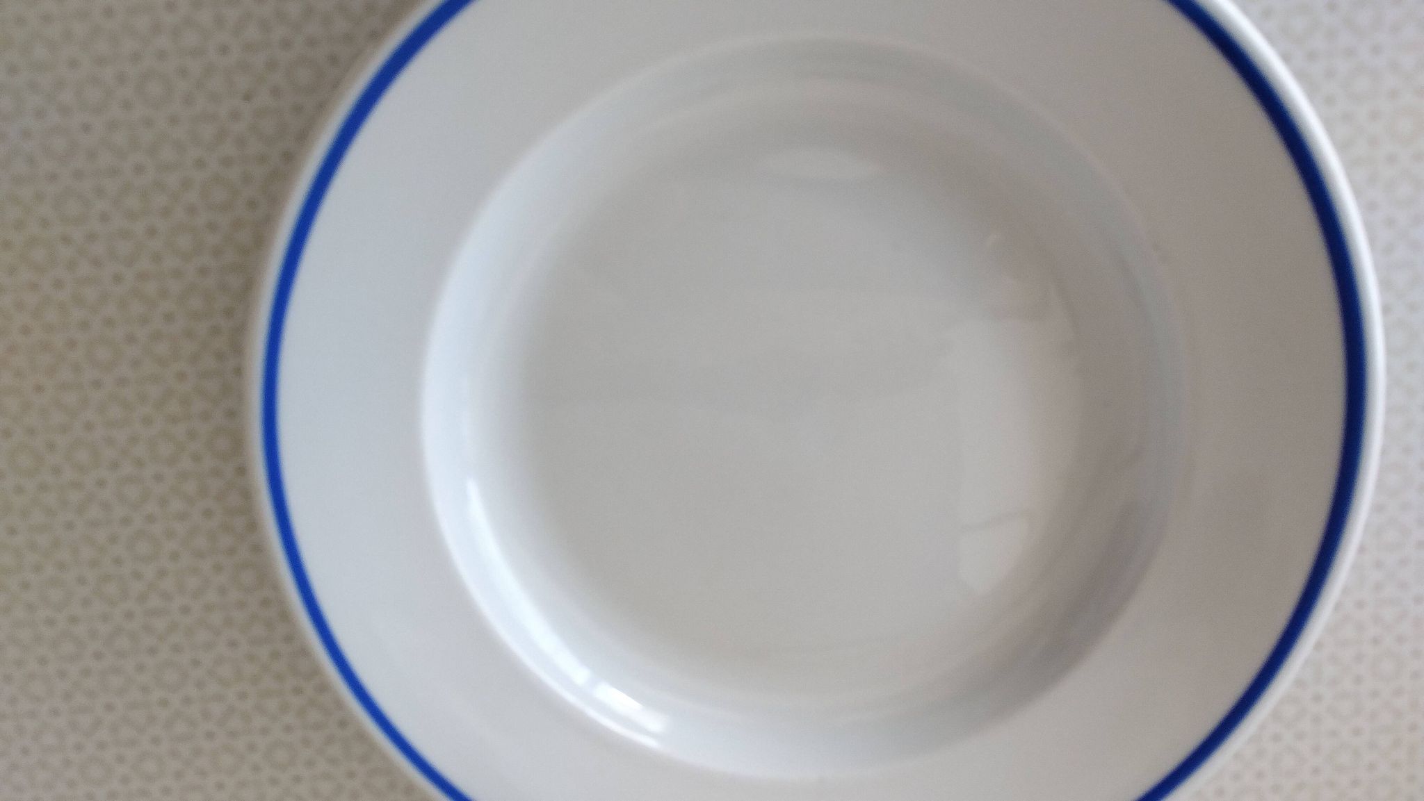 3 Pillivuyt white porcelain dinner plates with blue edging.
