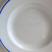 3 Pillivuyt white porcelain dinner plates with blue edging.