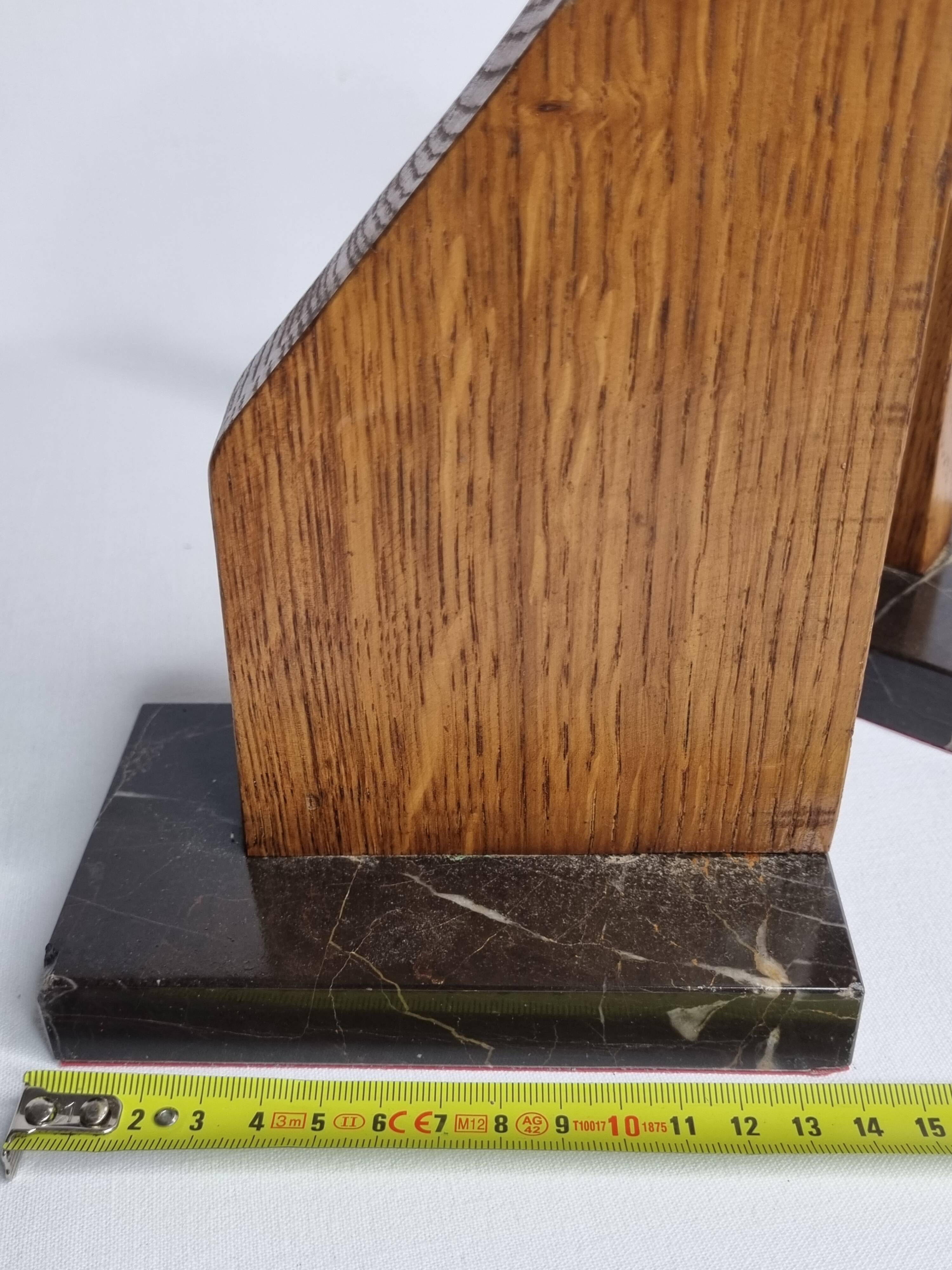 Pair of Art Deco bookends in solid wood and veined black marble
