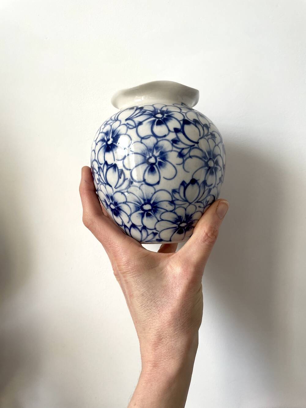 White and blue ceramic vase