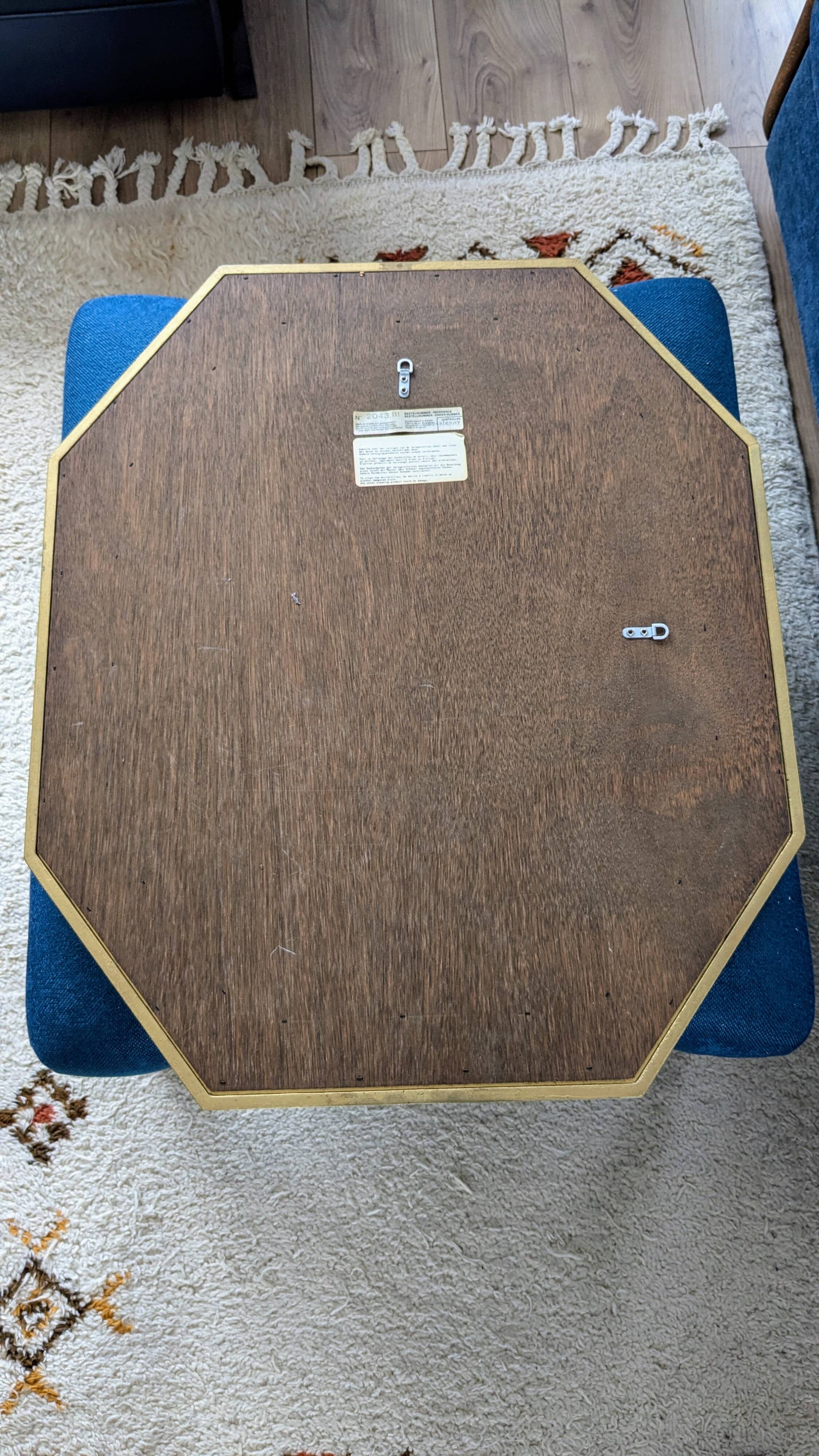 Octagonal mirror with brass parcloses by Jan Deknudt