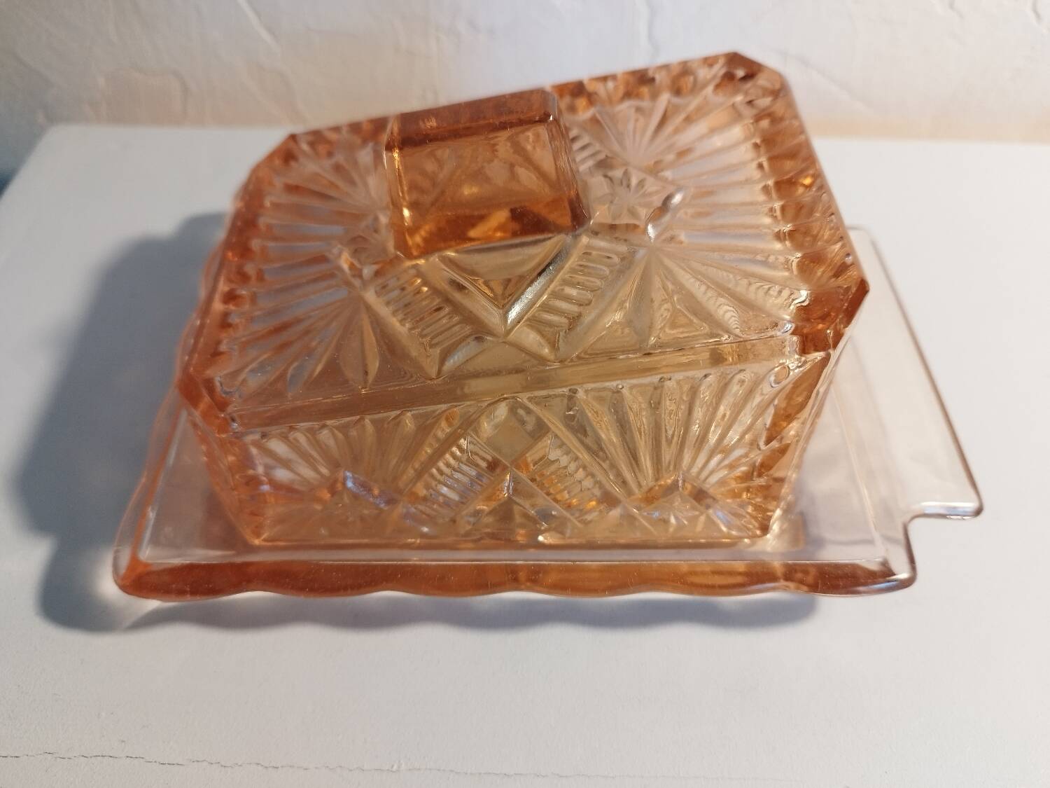 Pink glass butter dish