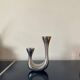 Designer cast iron candle holder