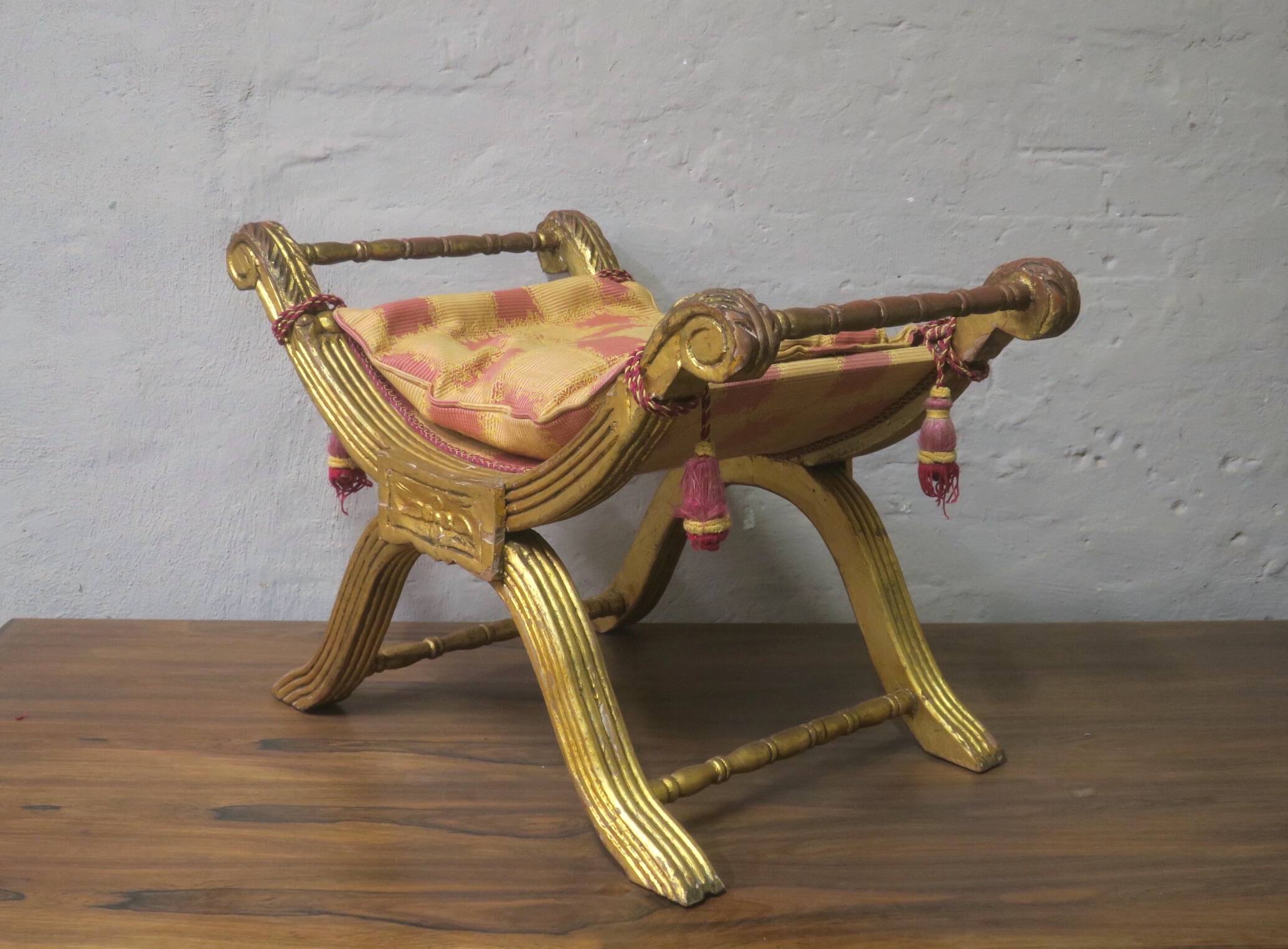 Antique parcel gilt cruciform stool
