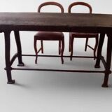 Industrial dining table with cast iron base