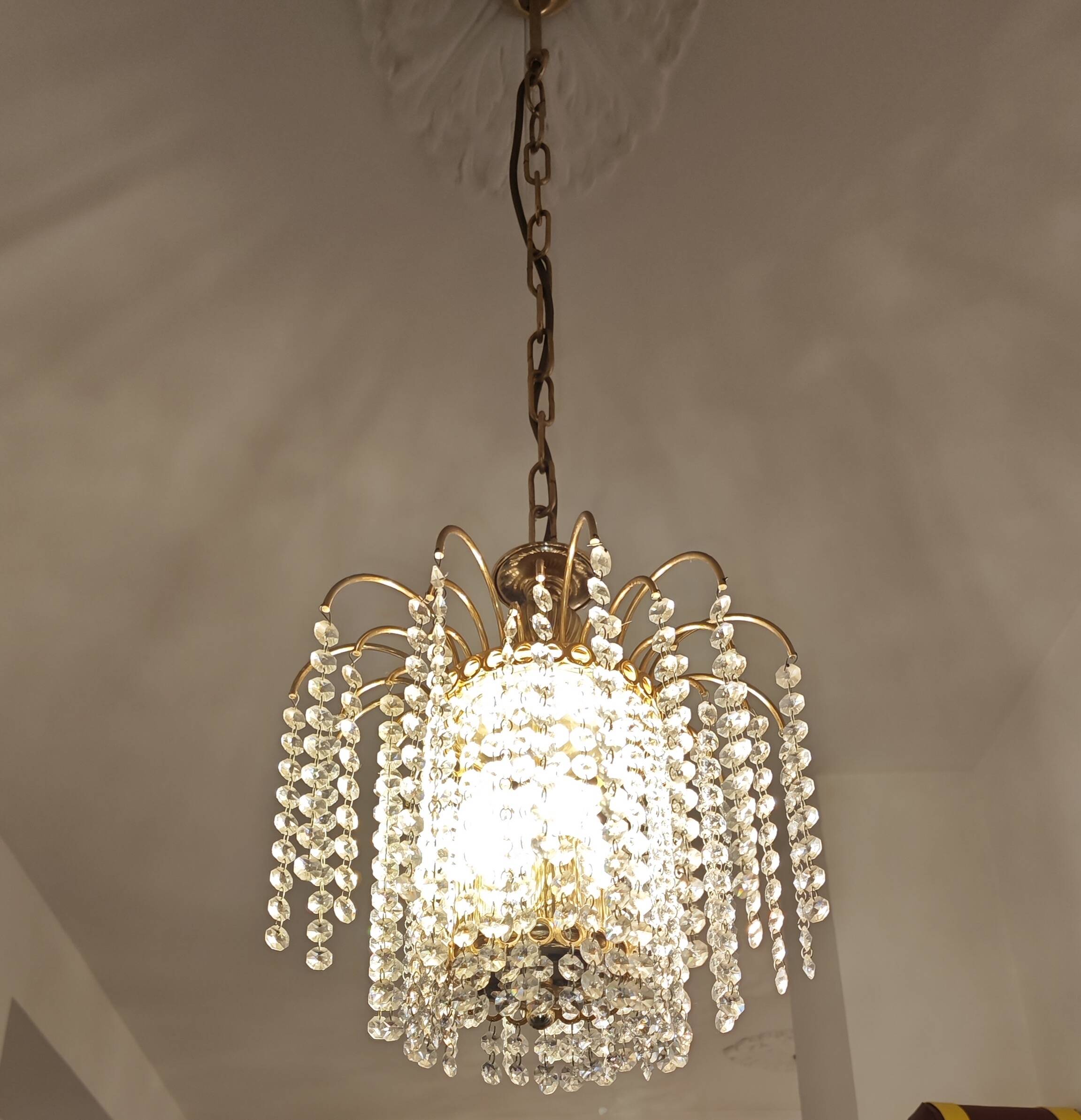 Brass cascading chandelier with crystals