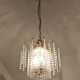 Brass cascading chandelier with crystals