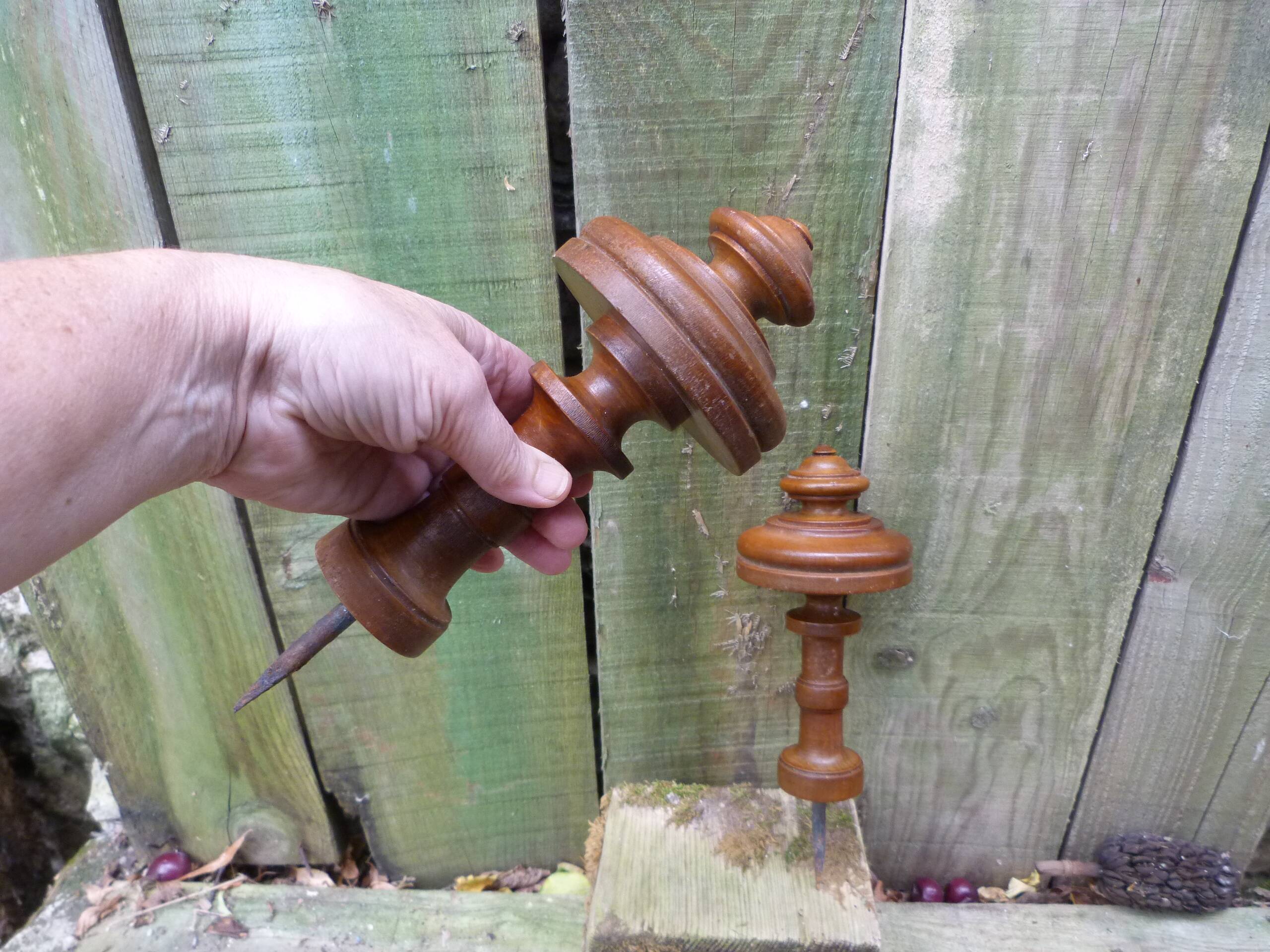 Pair of old turned wood pieces for curtain tieback finishes