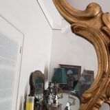 Beveled mirror and gilded wood