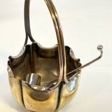 silver metal sugar bowl with gold patina