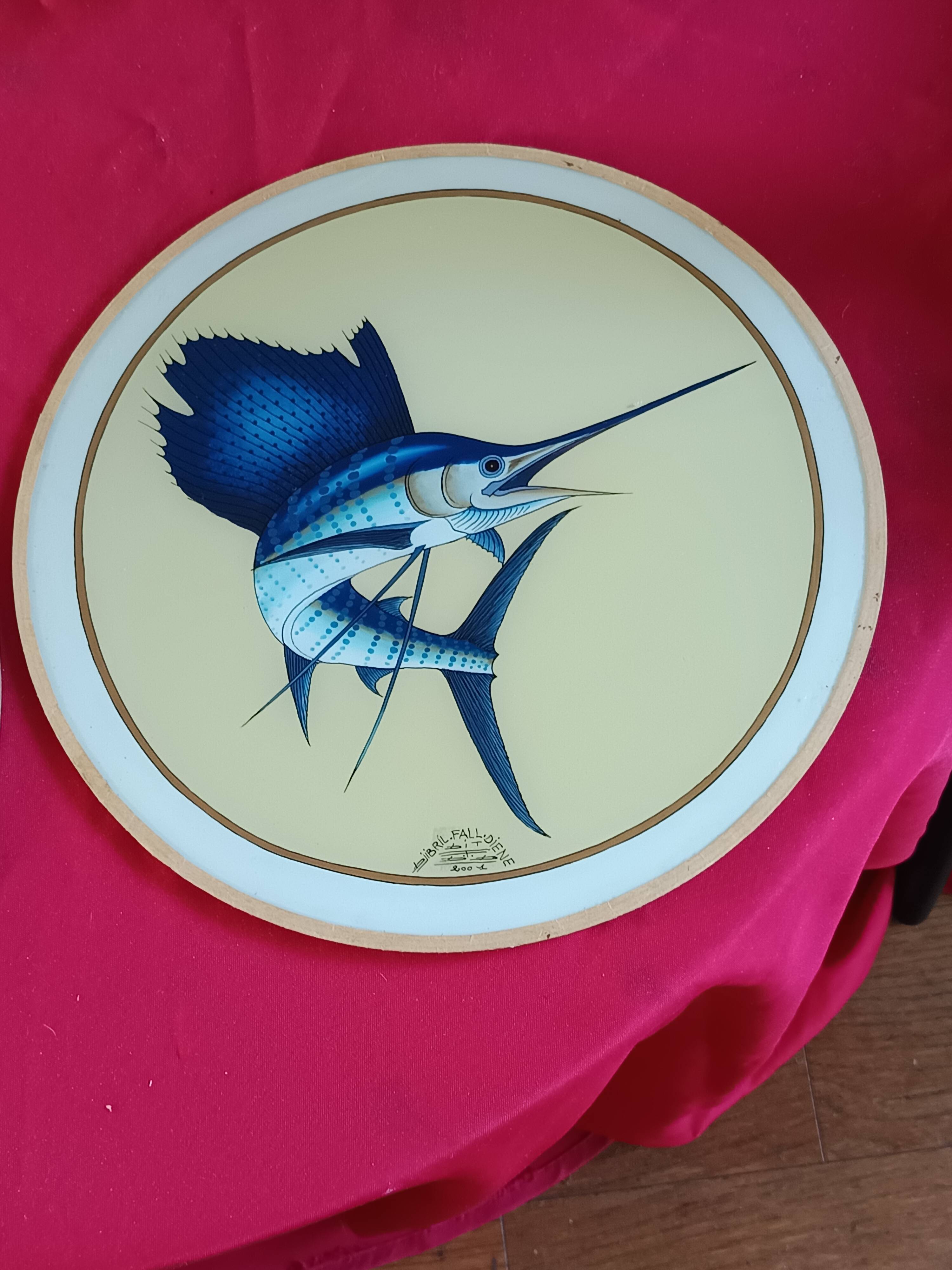 Pair of decorative panels signed by Djibril Fall Diène Exotic Fish