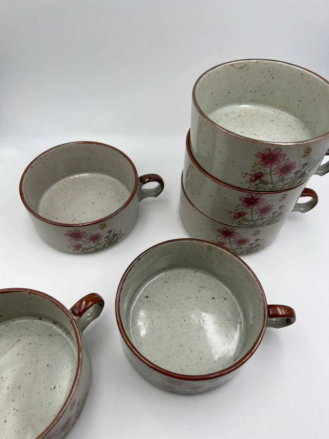 Six ceramic floral cups