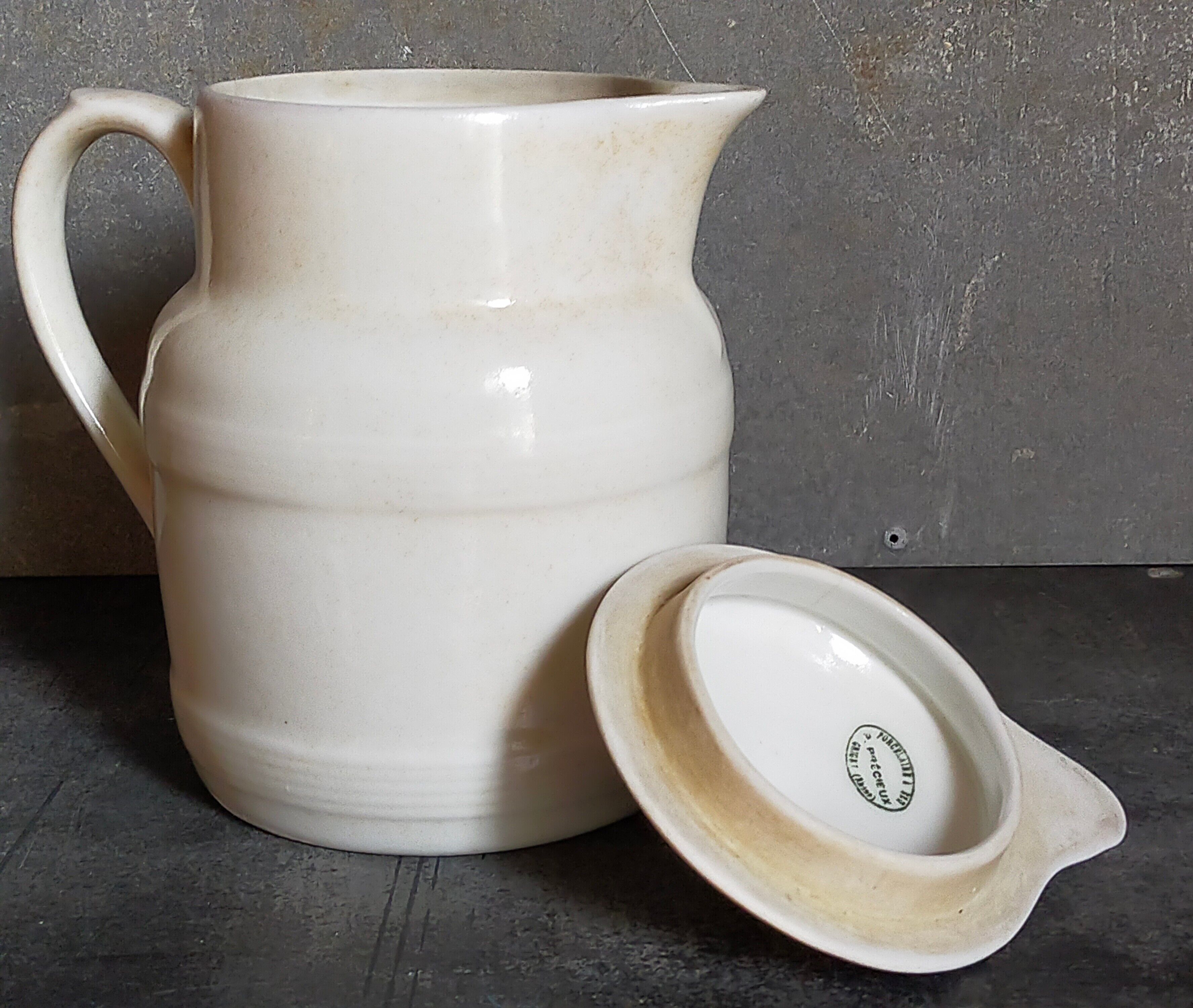 Covered pitcher in porcelain fire of Grigny XIXth stamped P.Precious