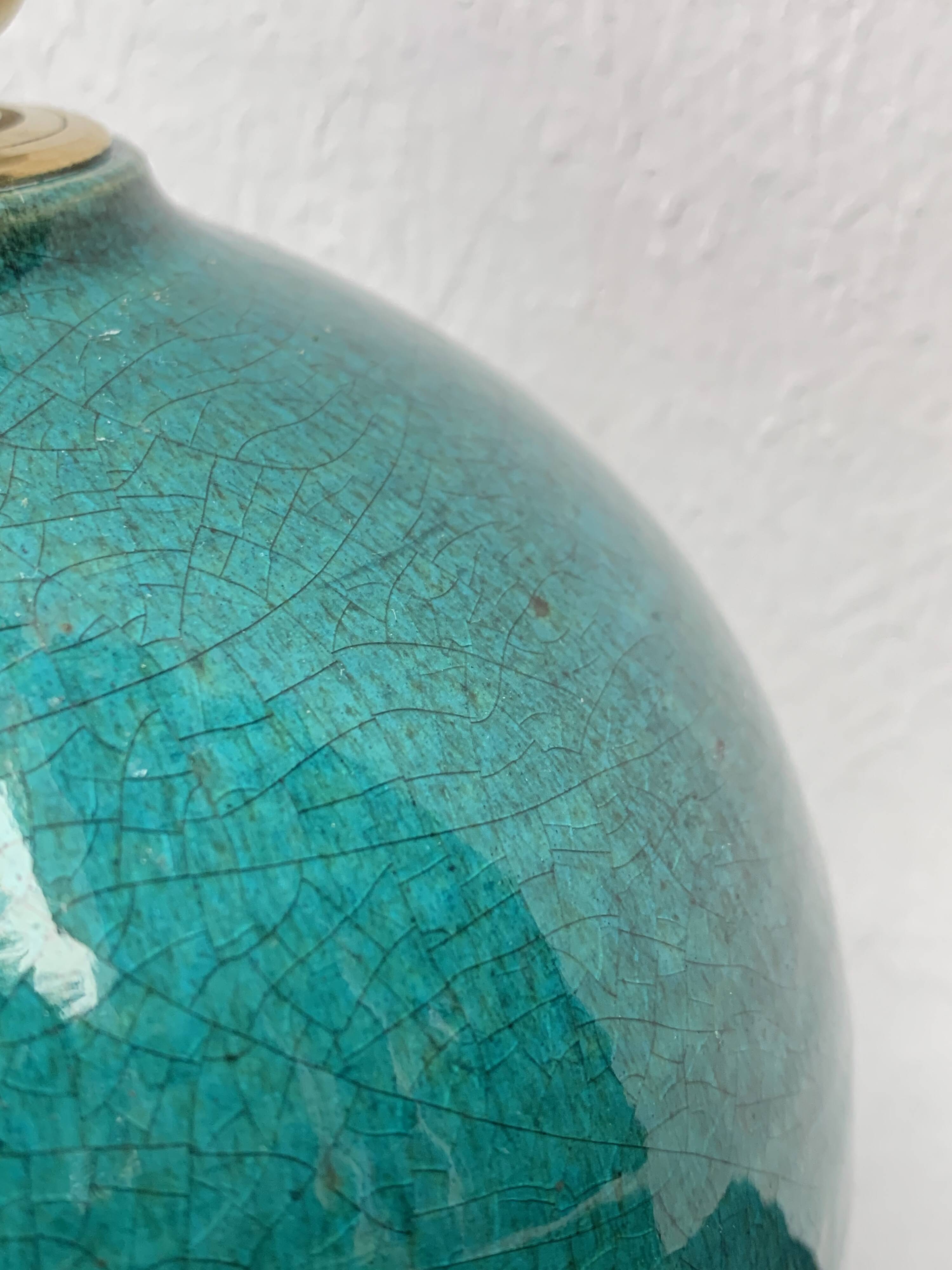 Ball lamp base in cracked ceramic and signed blue green