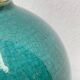 Ball lamp base in cracked ceramic and signed blue green