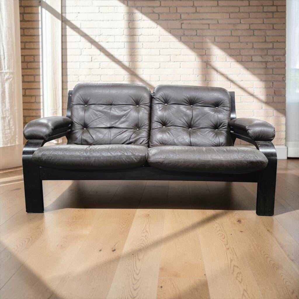 Vintage brown leather two-seater sofa