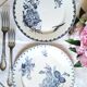 Old mismatched flat plates made of ironstone earthenware.