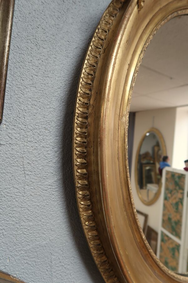 Miroir ovale en bois doré 93x73cm