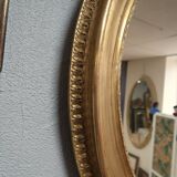 Miroir ovale en bois doré 93x73cm