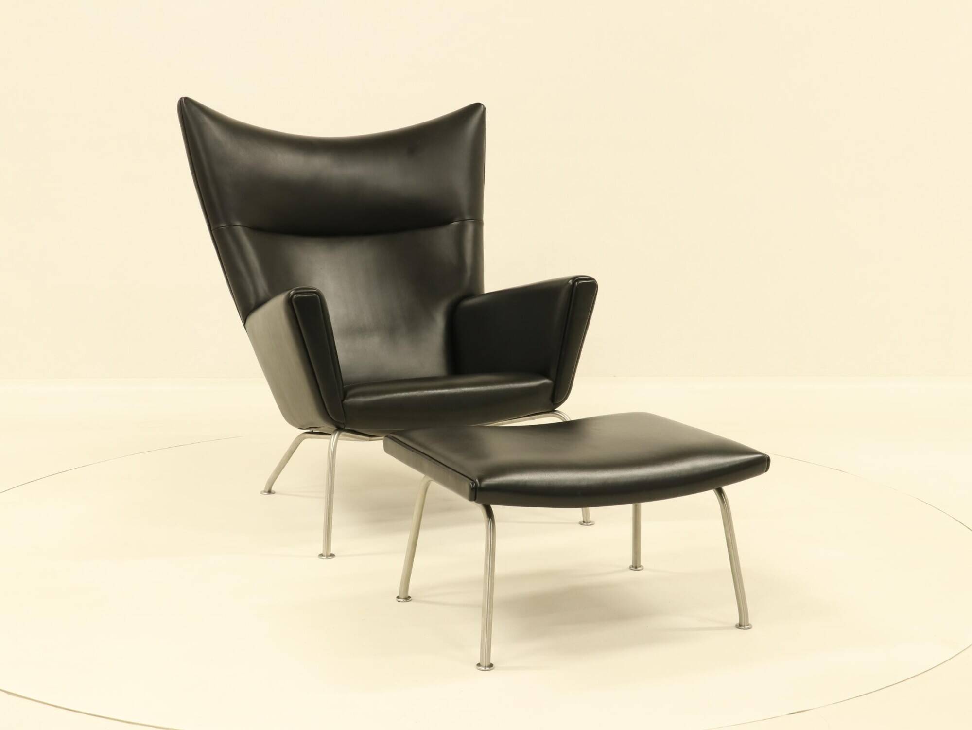 Wing chair & matching ottoman – CH445 & CH446 – by Hans Wegner