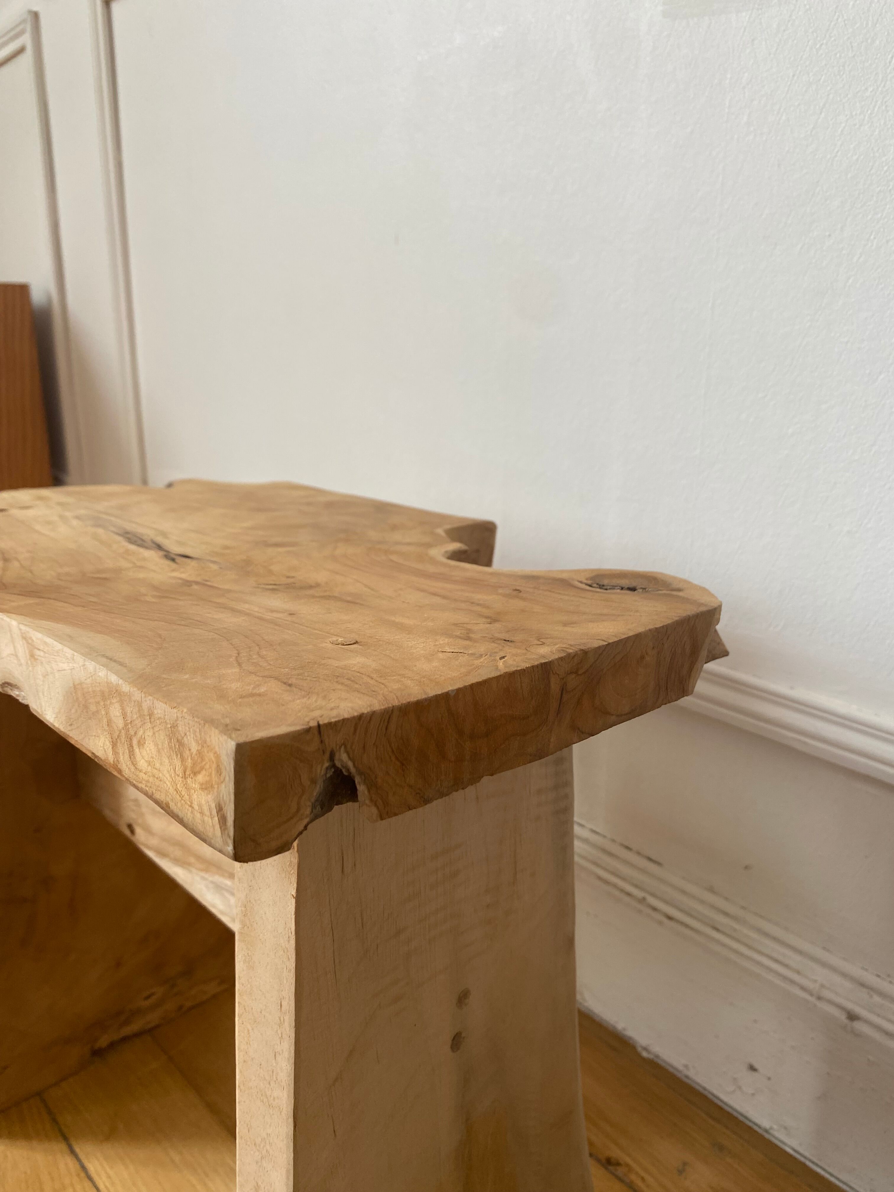 Low stool in raw wood