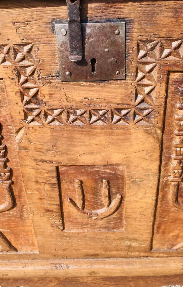 18th century chest, front view, carved with Menorahs and Hebrew symbols