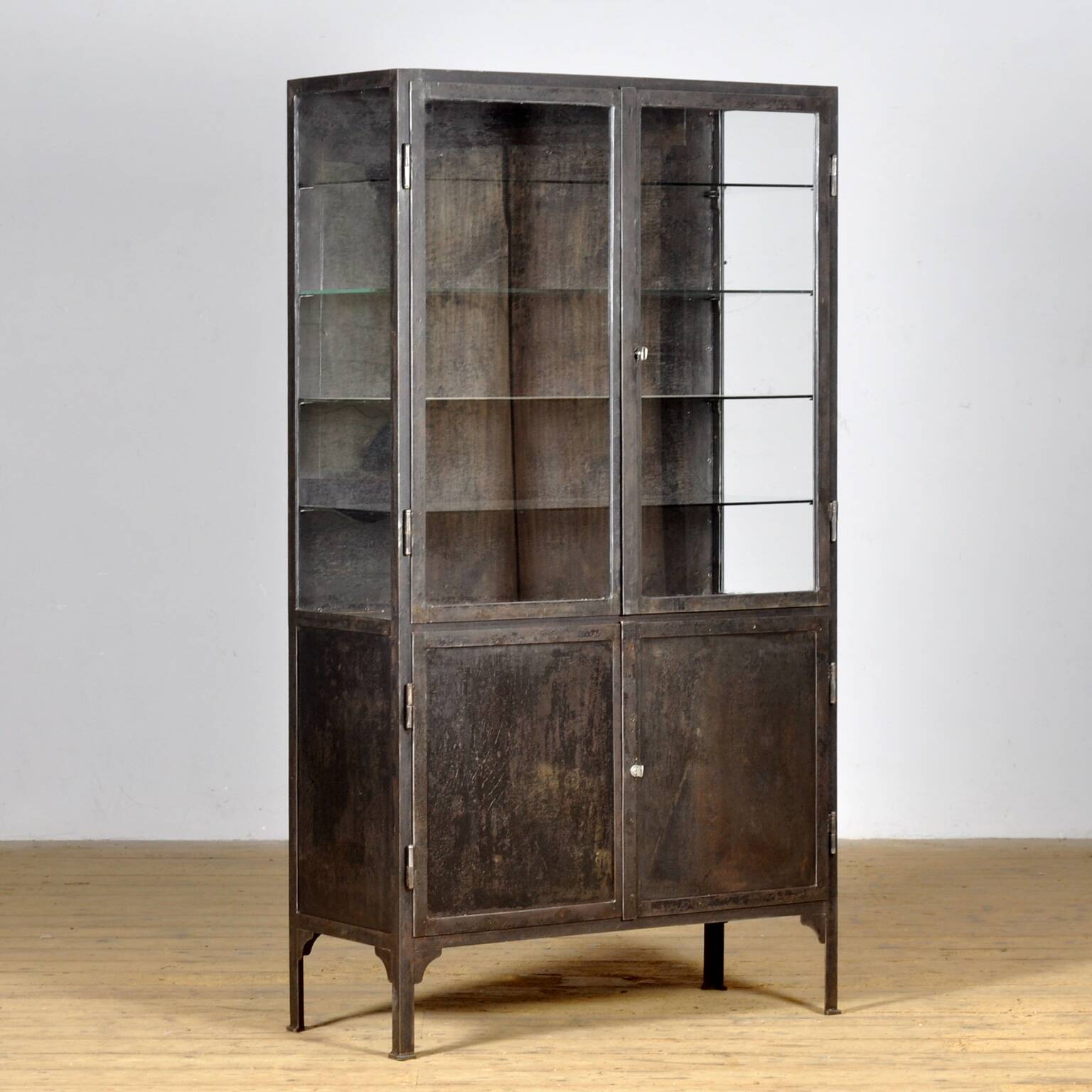 Polished iron medical cabinet, 1930s