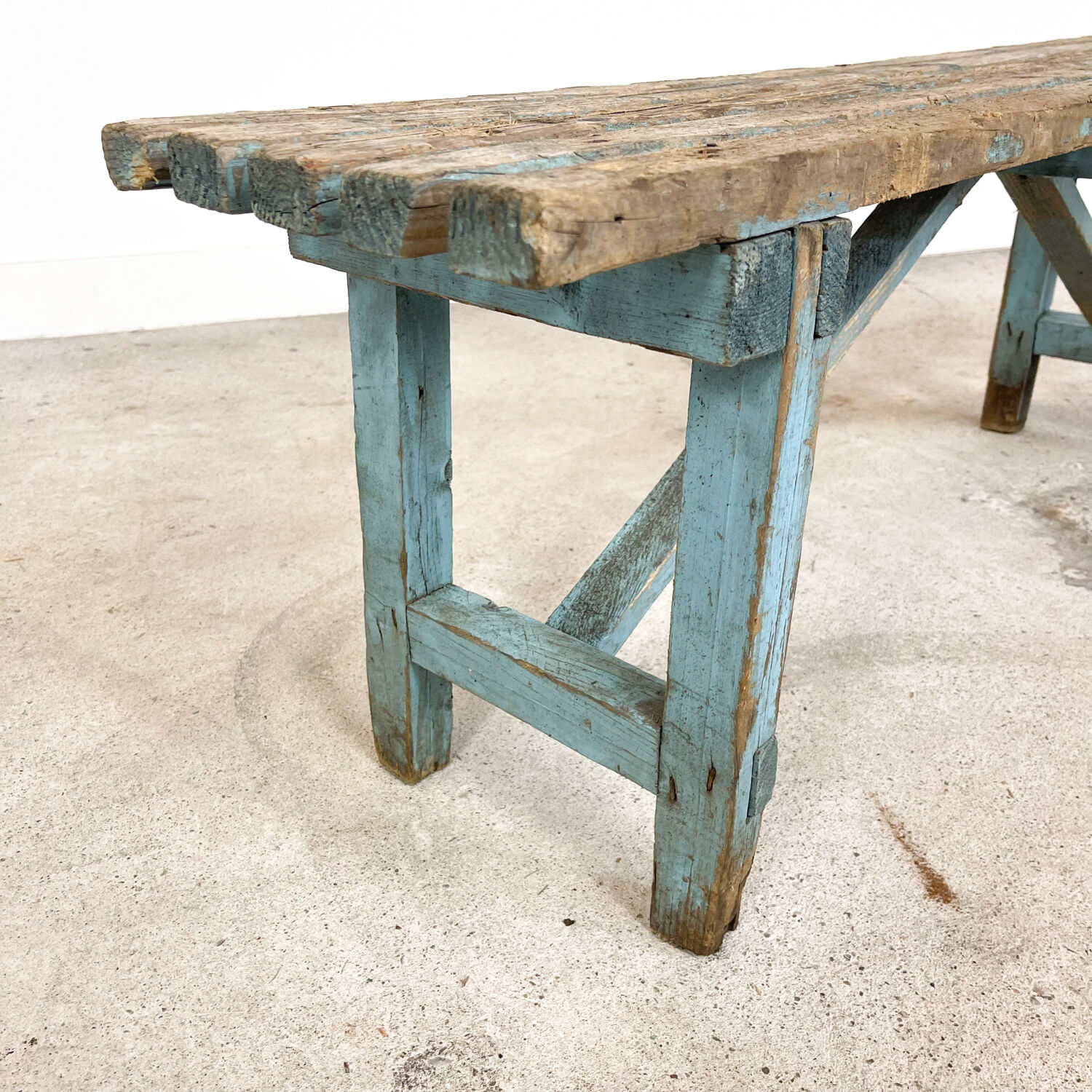 Light blue painted wooden farmhouse bench
