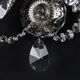 Antique wall light with 2 lights from the 1900s, featuring crystal bobeches and pendants.