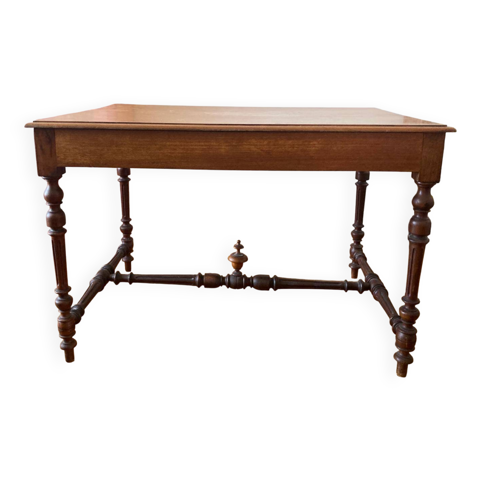 Table with a spacer topped with a spinning top.