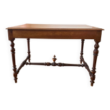 Table with a spacer topped with a spinning top.