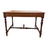 Table with a spacer topped with a spinning top.