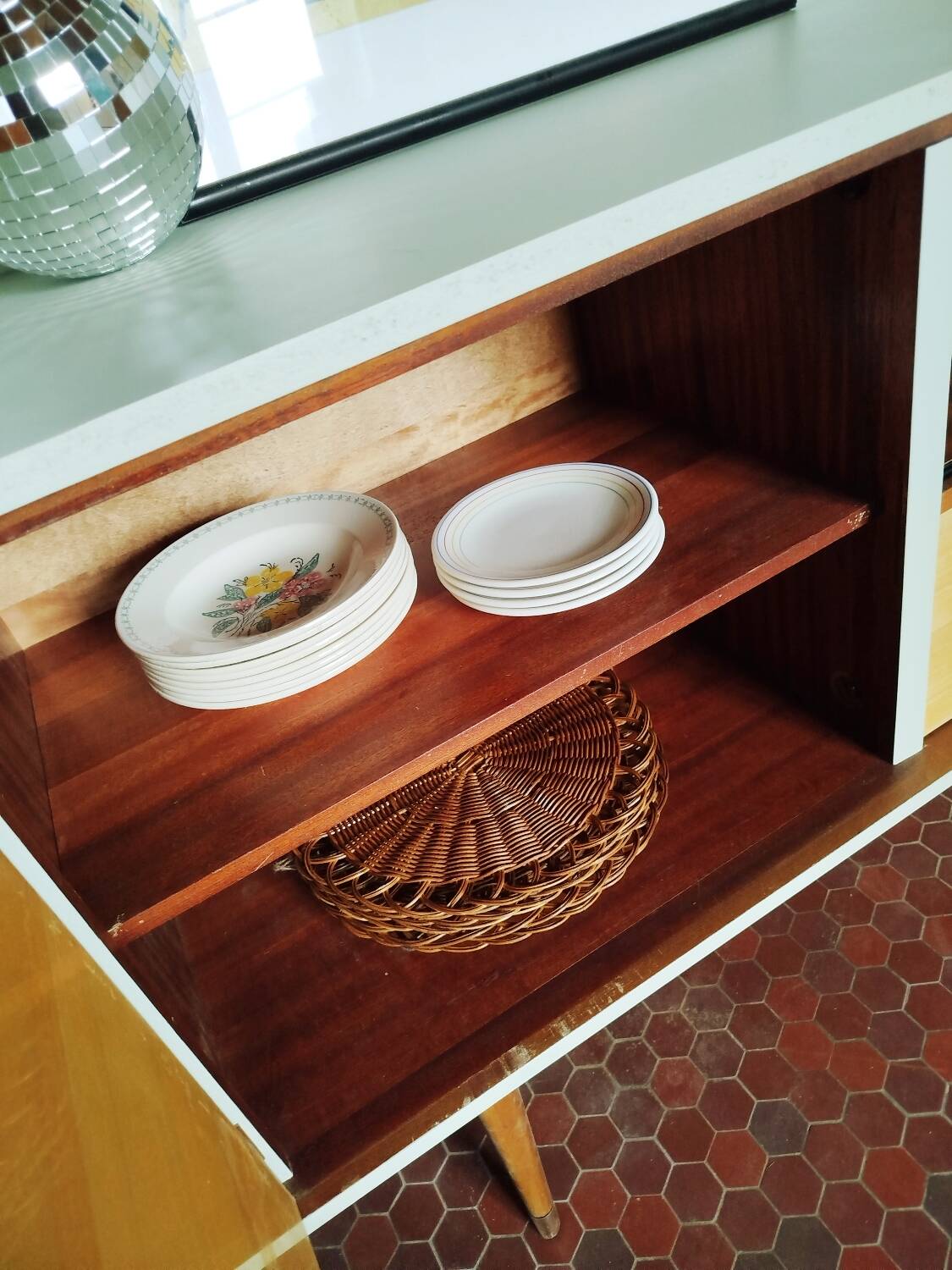 Wooden sideboard in soft green