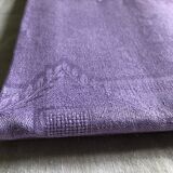 Old damask tablecloth in linen and purple silk