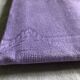 Old damask tablecloth in linen and purple silk