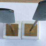Pair of brass and marble bookends