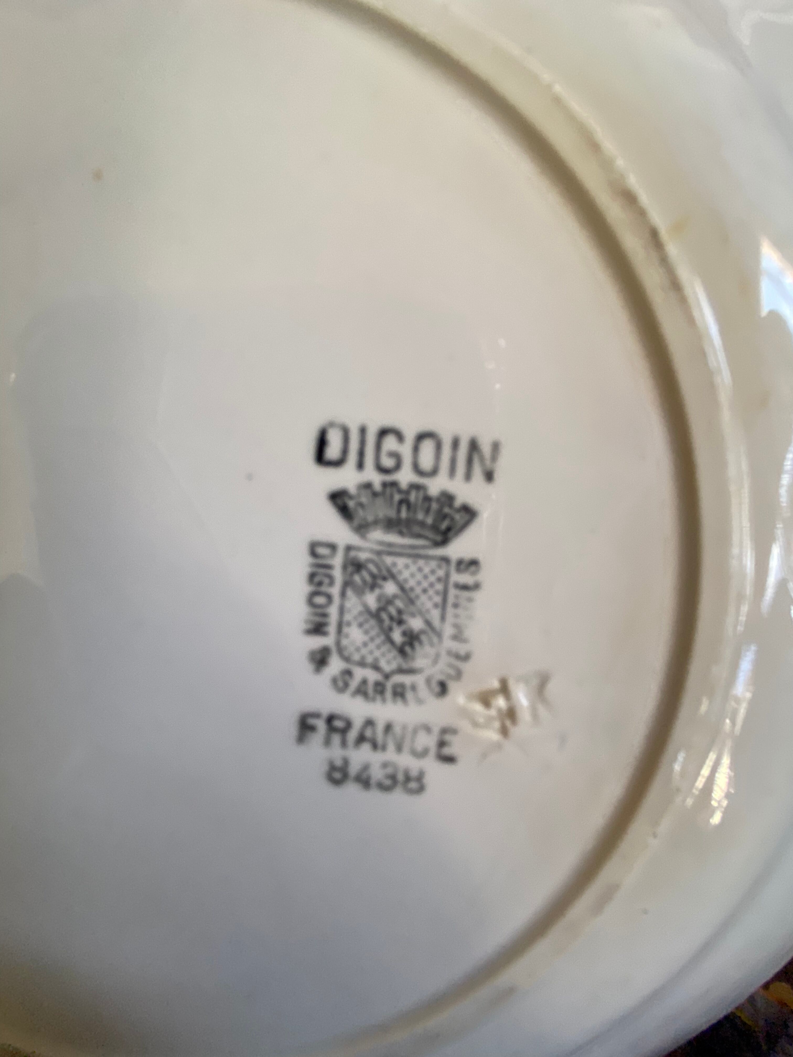 7 matching dessert plates in red green and blue.