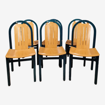 Series of 6 chairs of the brand Baumann model Argos in stained beech and varnished natural wood