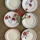 Old flat plates in red, green and blue gray.