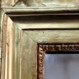 Miroir en bois doré, style Louis XVl, début XXe