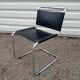 Pair of Bersanelli chairs in black and burgundy leather
