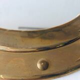 Porthole mirror in gilded brass