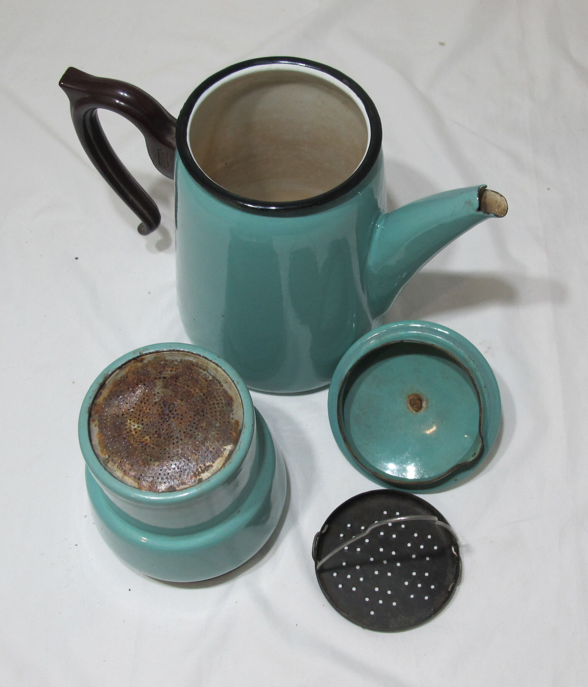 large vintage coffee maker made of enamelled sheet metal